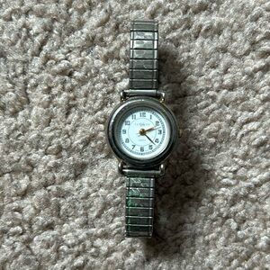 LA Express women’s vintage silver bracelet watch fits a small-medium sized wrist
